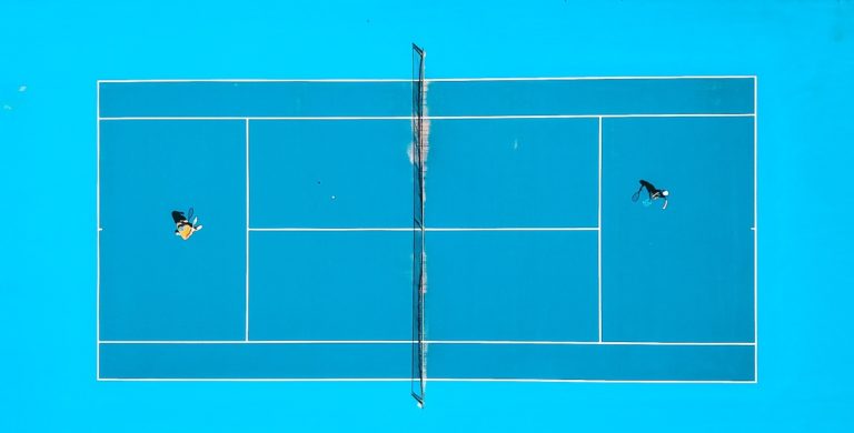 Improve the Tennis Serve Through Your Toss